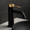 grifo lavabo negro y dorado